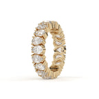 Gold ring with diamonds on a white background