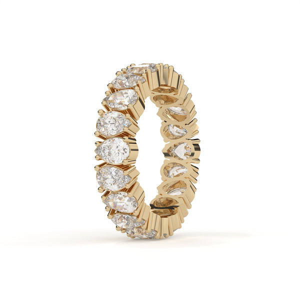 Gold ring with diamonds on a white background