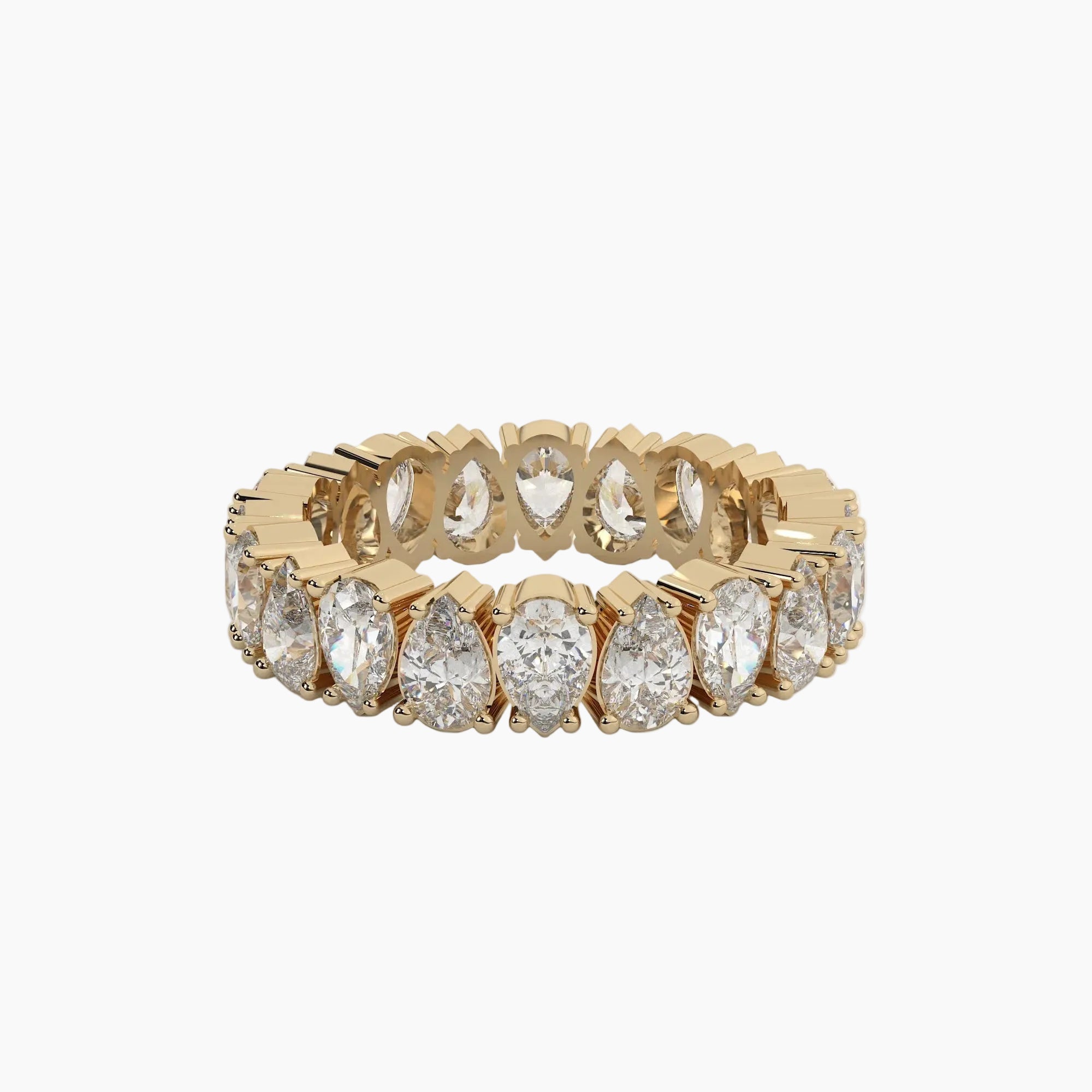 Gold ring with pear-shaped diamonds on a white background