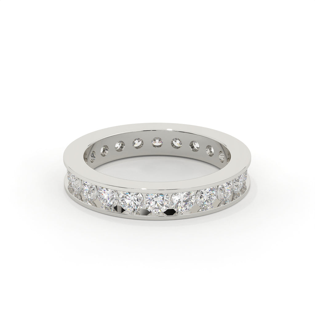 Silver ring with embedded diamonds on a white background