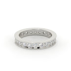 Silver ring with embedded diamonds on a white background