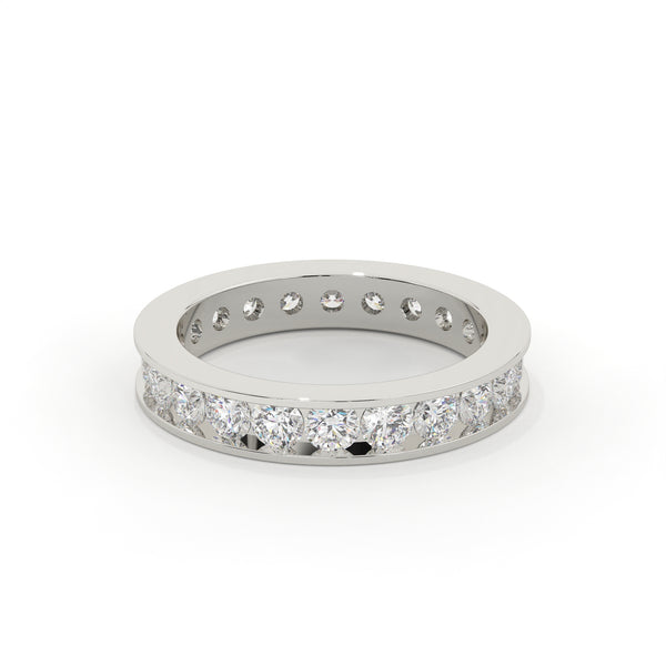 Silver ring with embedded diamonds on a white background