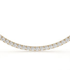 Gold and diamond necklace on a white background