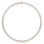 Rose gold necklace with diamonds on a white background