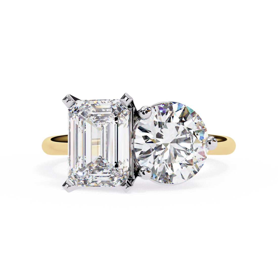 Diamond ring with emerald-cut and round-cut diamonds on a white background