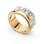 Gold ring with diamond accents on a white background