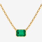Emerald cut green gemstone pendant necklace in yellow gold with a bezel setting