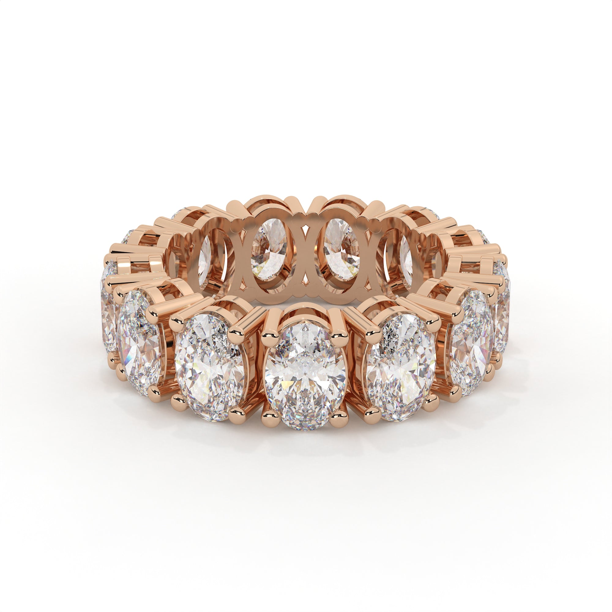 Rose gold ring with diamonds on a white background