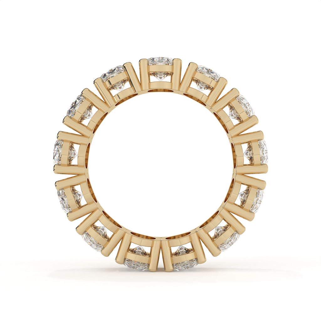 Gold ring with diamond accents on a white background