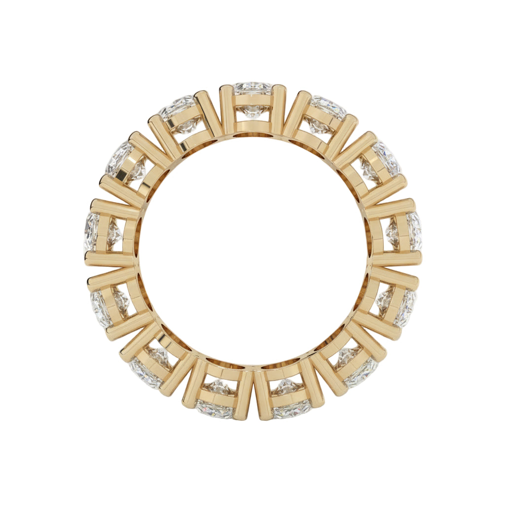 Gold ring with diamond accents on a white background