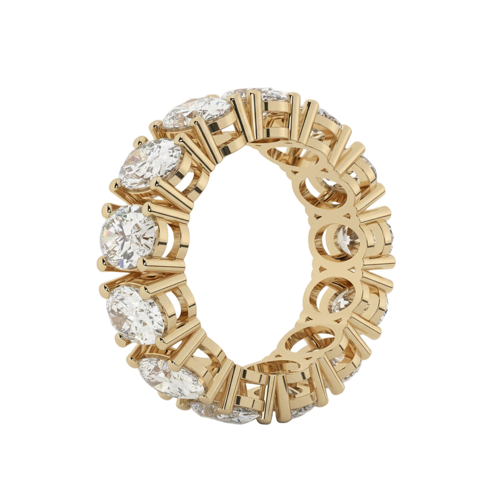 Gold ring with diamonds on a white background