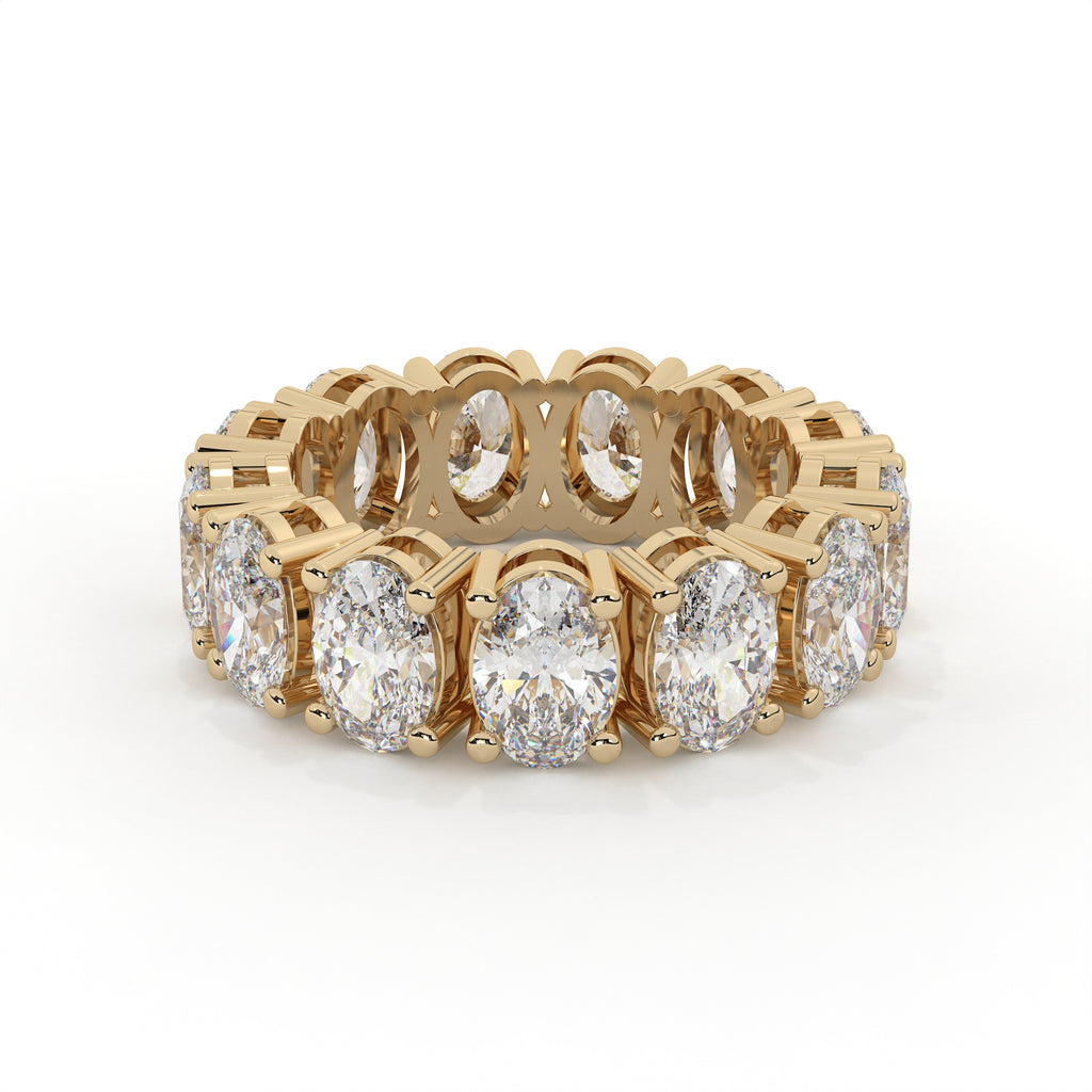 Gold ring with diamonds on a white background