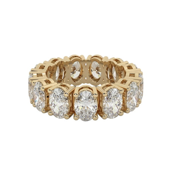 Gold ring with diamonds on a white background