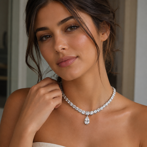 Woman wearing a sparkling necklace with a blurred background
