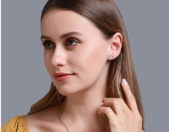 Emerald Cut Stud with V Prong Setting