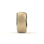 Gold ring with black interior on a white background
