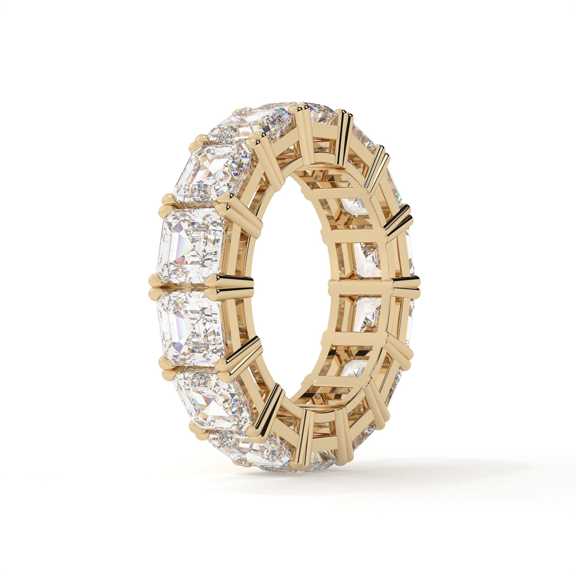 Gold ring with diamond accents on a white background