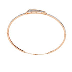 Rose gold bracelet with diamond accents on a white background