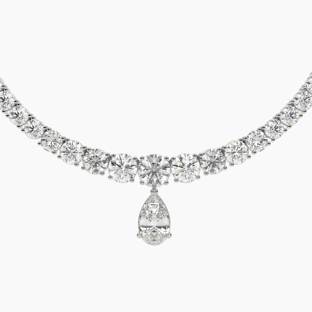 Diamond necklace with a teardrop pendant on a white background