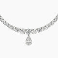 Diamond necklace with a teardrop pendant on a white background