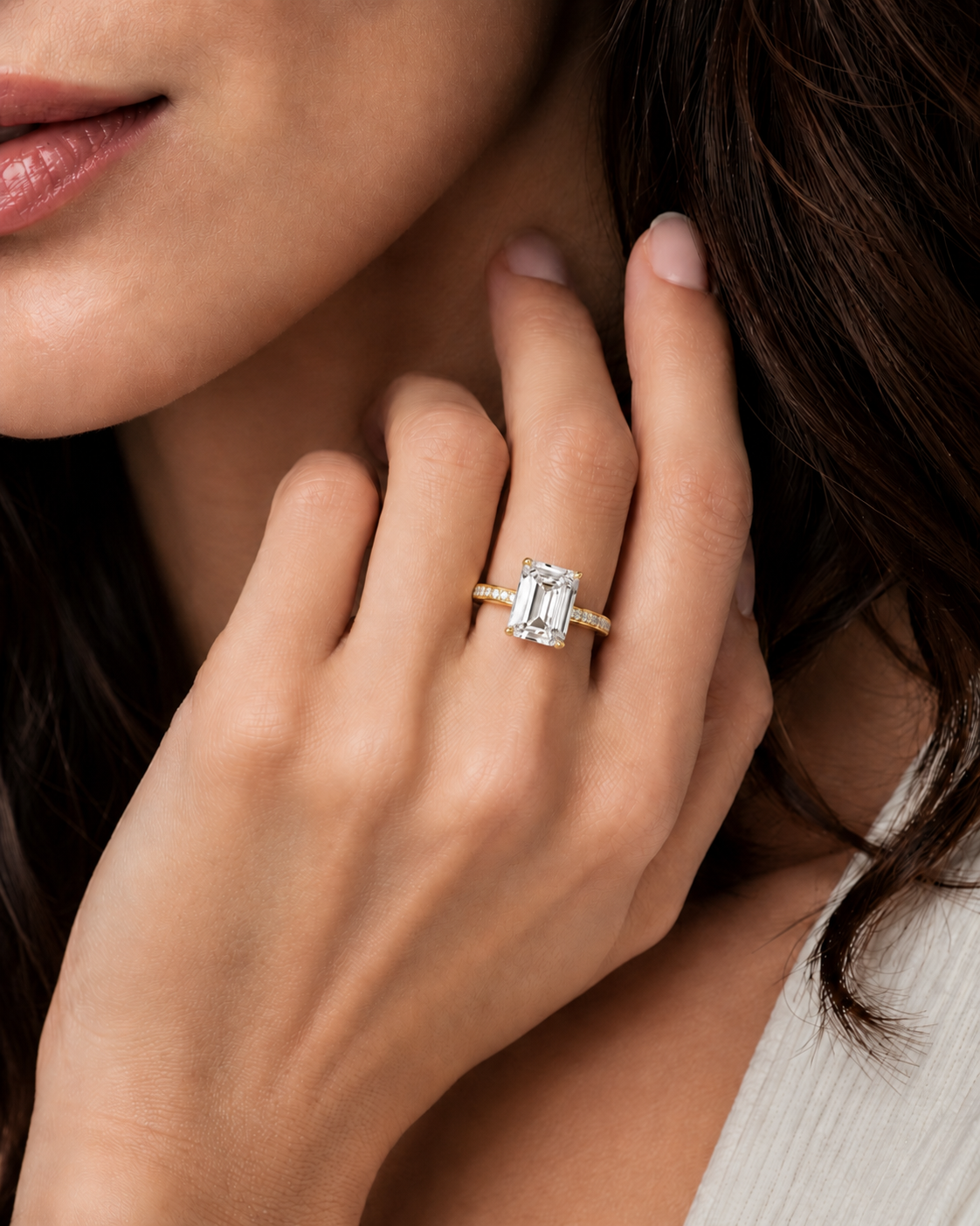 2.60 carat emerald cut diamond side stone engagement ring with EF color and VVS-VS clarity grade.