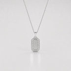Silver pendant necklace on a light gray background