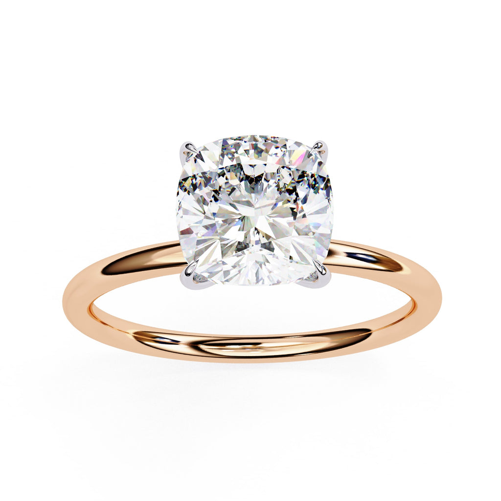 Rose gold ring with a large diamond on a white background
