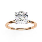Rose gold ring with a large diamond on a white background