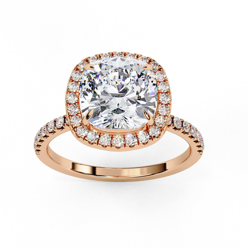 Rose gold ring with a large diamond and smaller diamonds on the band against a white background