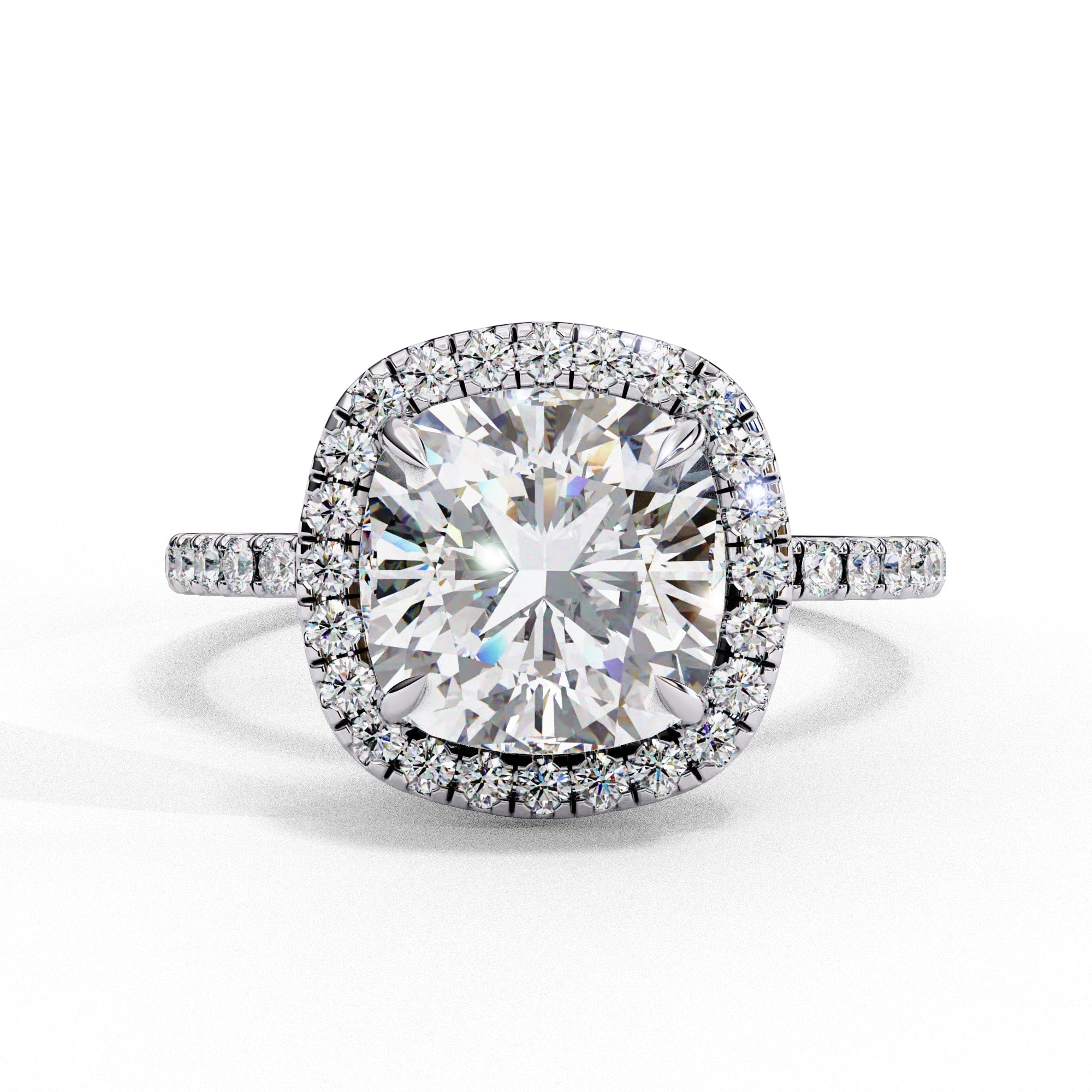 Diamond ring with a large central gemstone and smaller stones around on a white background