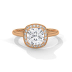 Rose gold ring with a large diamond and smaller diamonds around on a white background