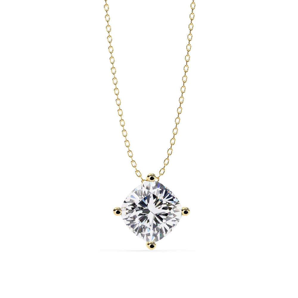 Gold necklace with a square-cut diamond pendant on a white background
