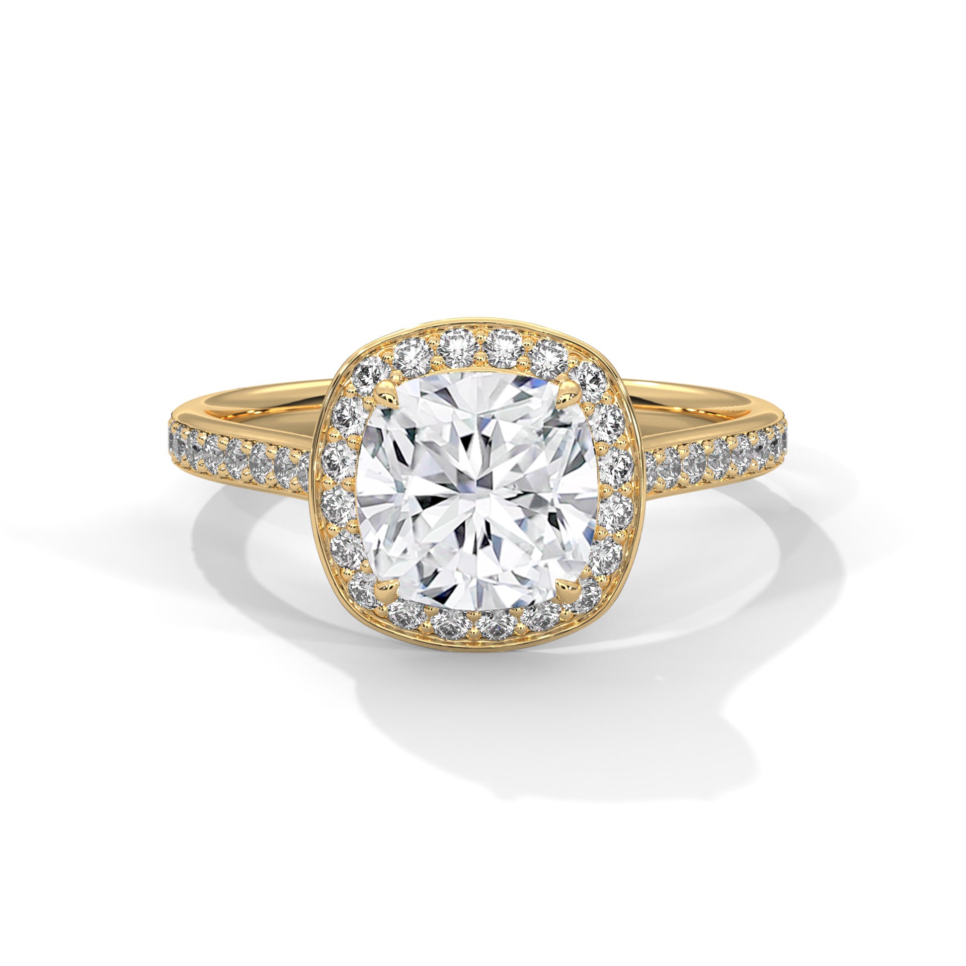 Gold ring with a large diamond and smaller diamonds on the band against a white background