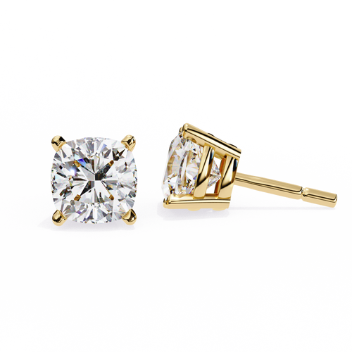 Gold stud earrings with clear gemstones on a white background