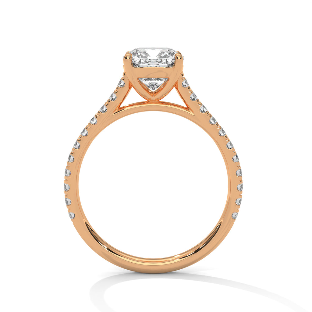 Rose gold ring with diamond accents on a white background