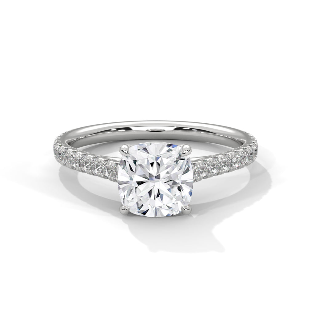 Diamond ring with a white gemstone on a white background
