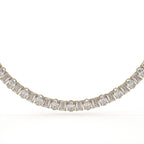 Diamond necklace with baguette-cut stones on a white background