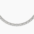 Diamond necklace with baguette and round cut diamonds on a white background