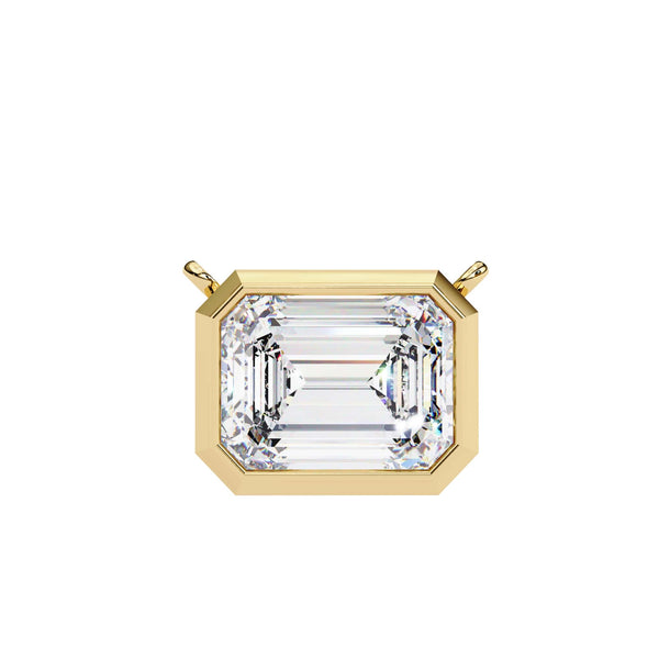 Gold pendant with a large rectangular gemstone on a white background