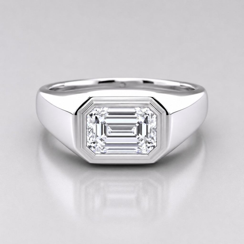 Silver ring with a large diamond on a gray background