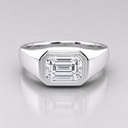 Silver ring with a large diamond on a gray background