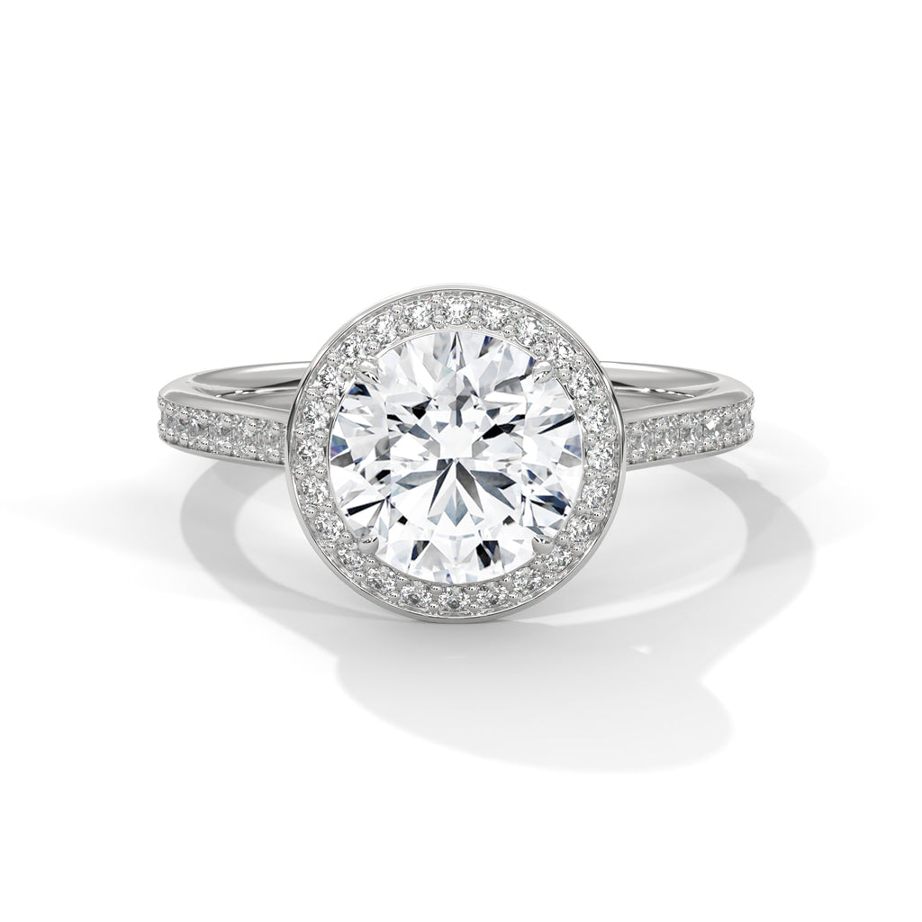 Diamond ring with a white gemstone and diamond-studded band on a white background