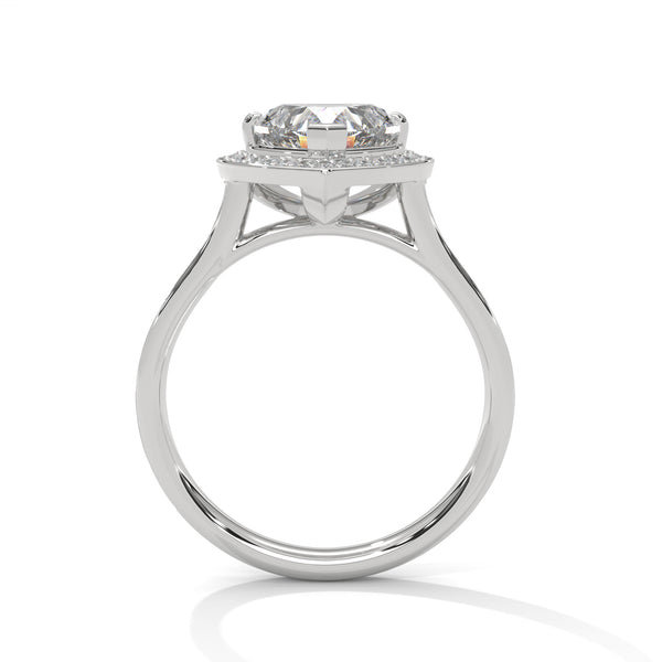 Diamond ring with a white gold band on a white background
