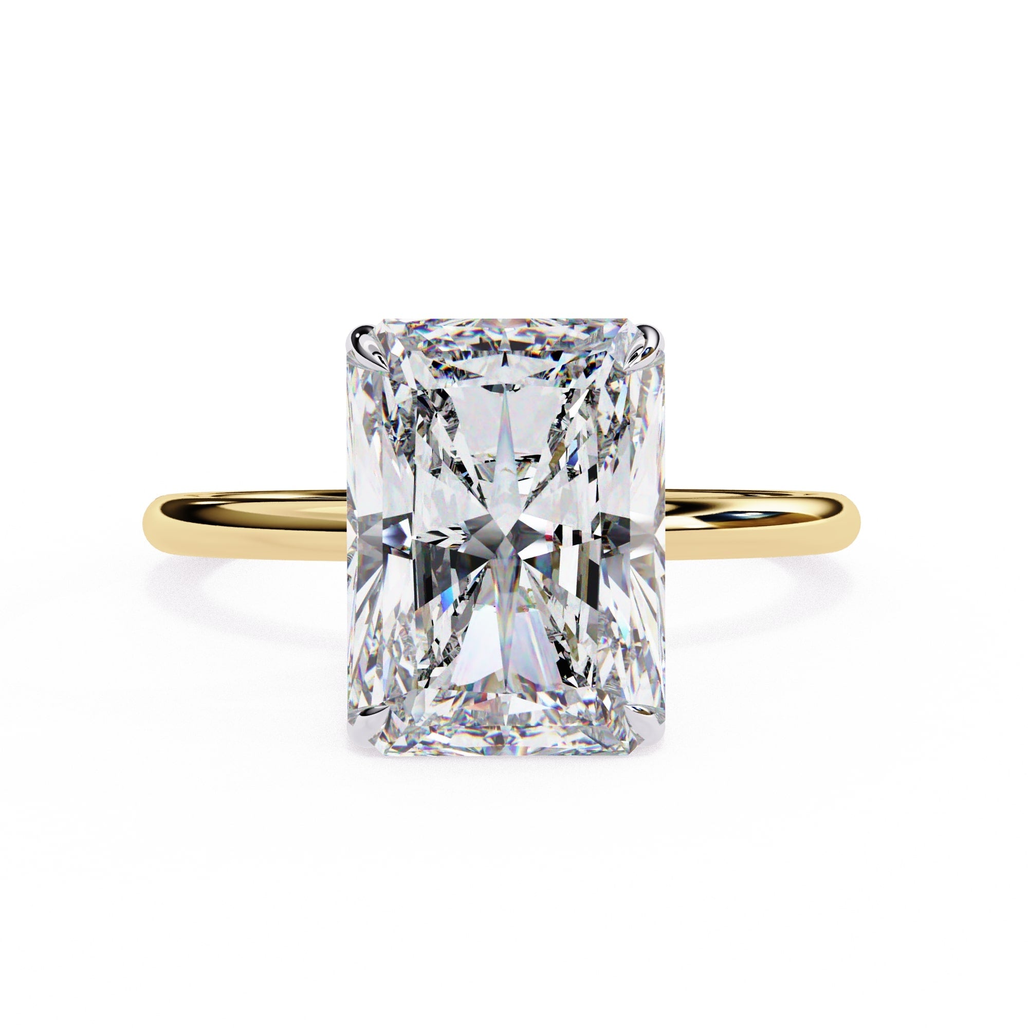 Gold ring with a large rectangular diamond on a white background