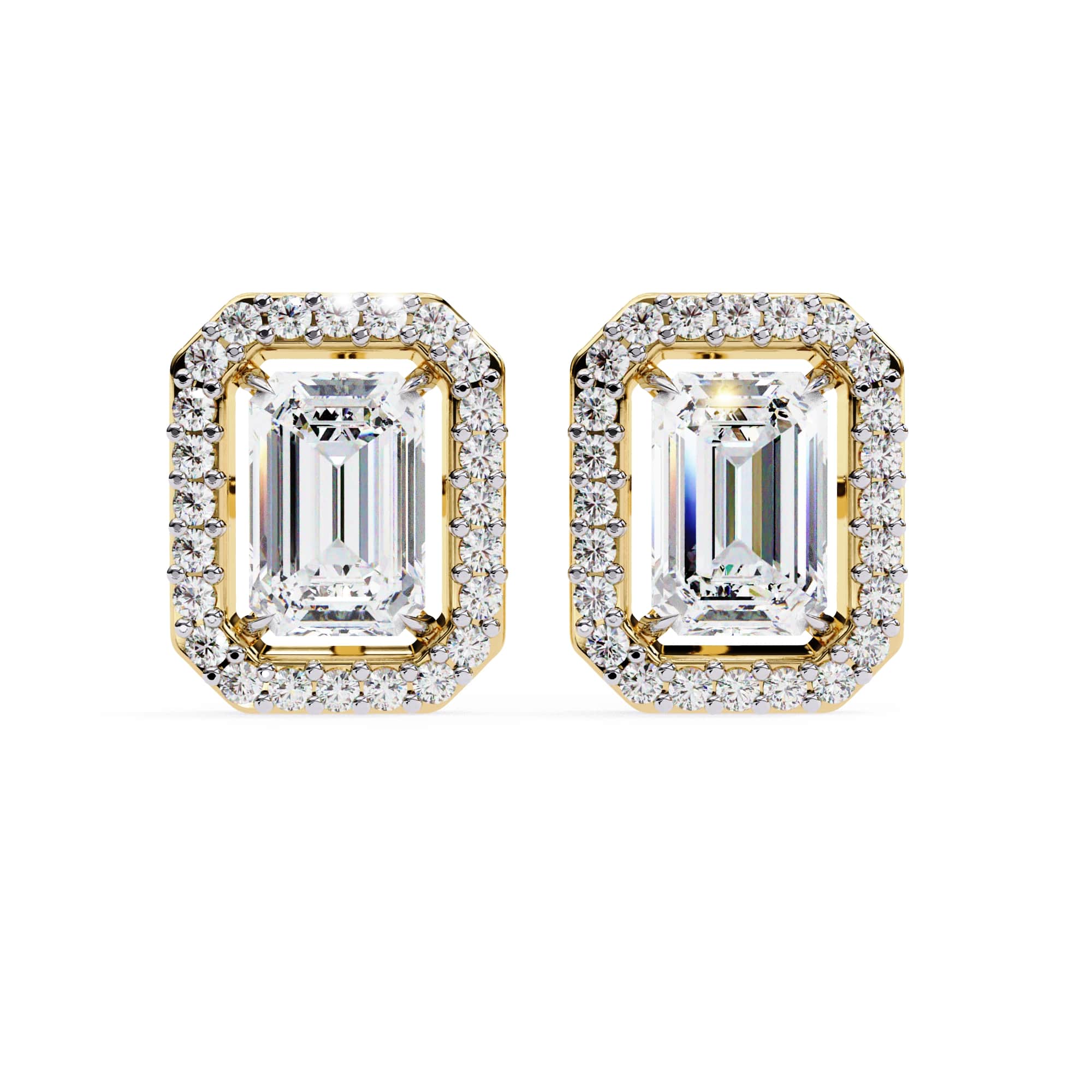 Pair of diamond earrings with gold frames on a white background