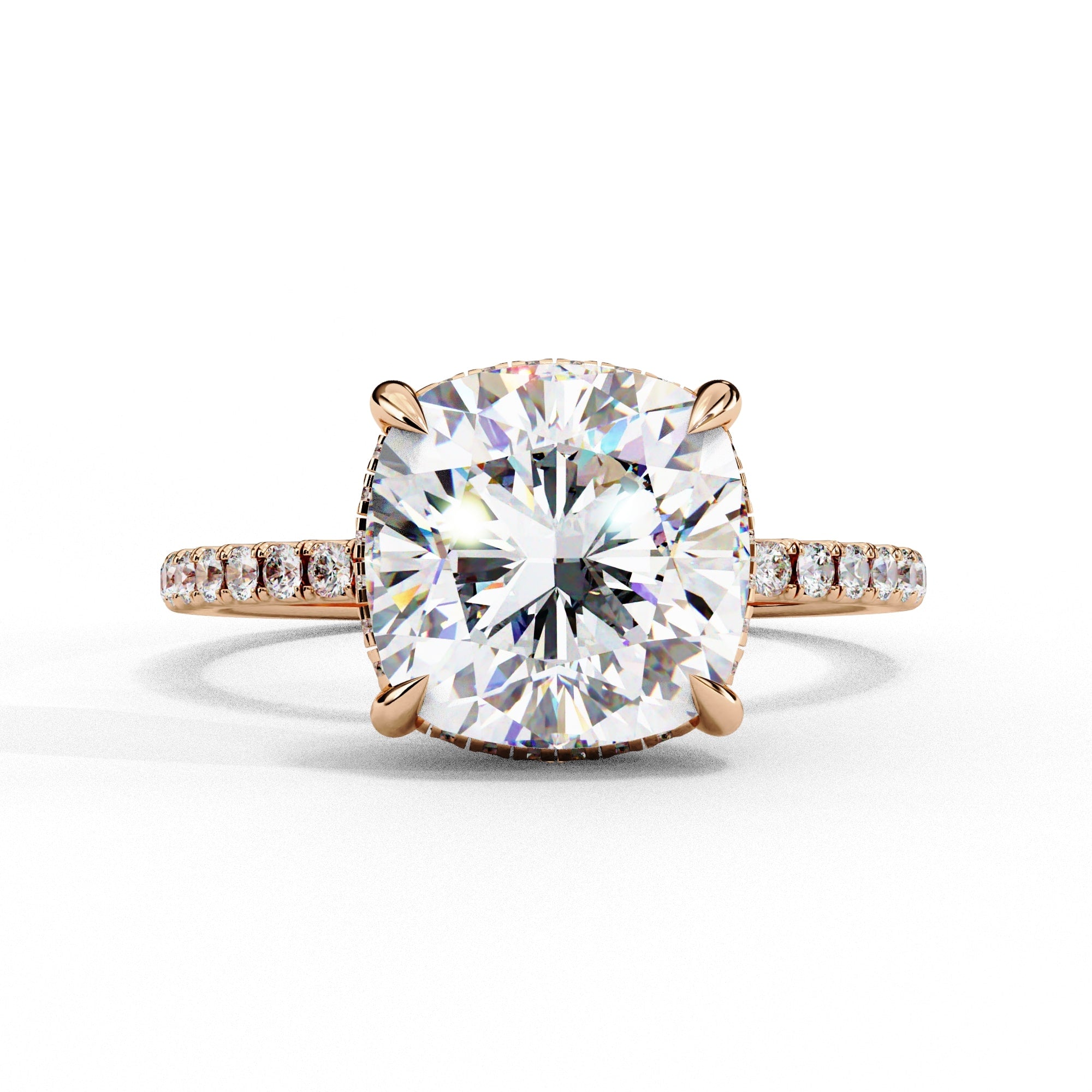 Diamond ring with rose gold band on a white background