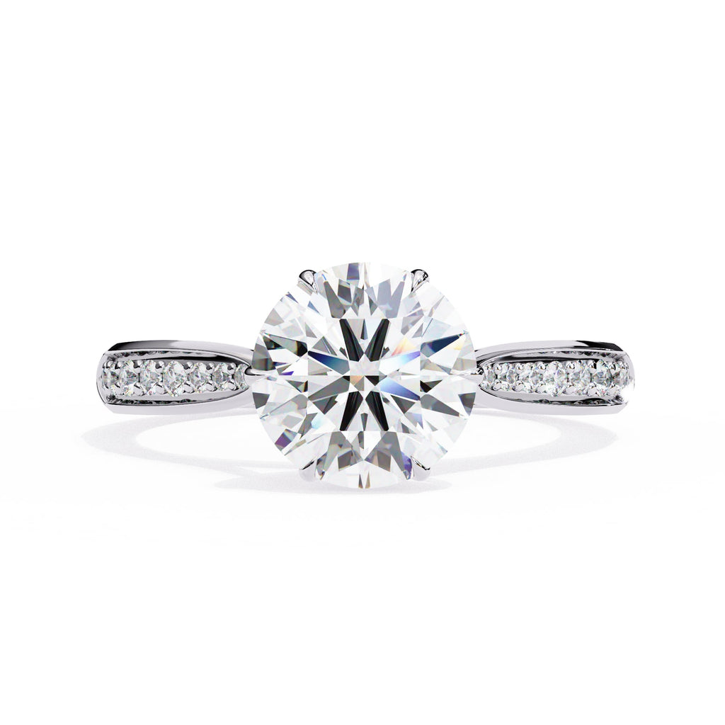 Diamond ring with a large central gemstone on a white background