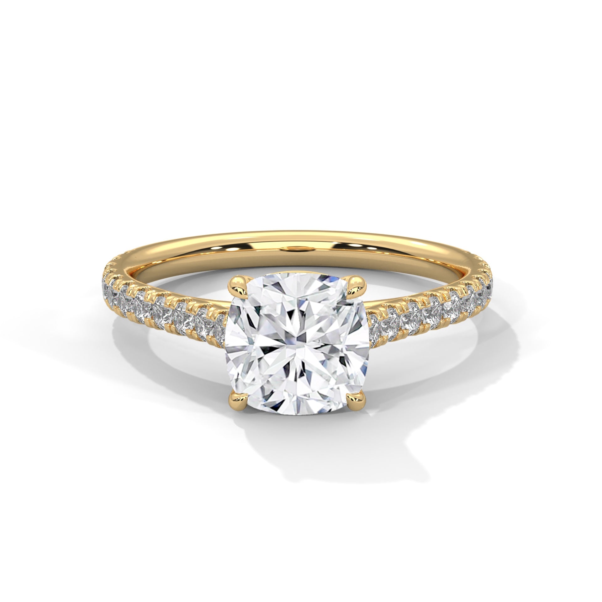 Gold ring with a large diamond and smaller diamonds on the band against a white background