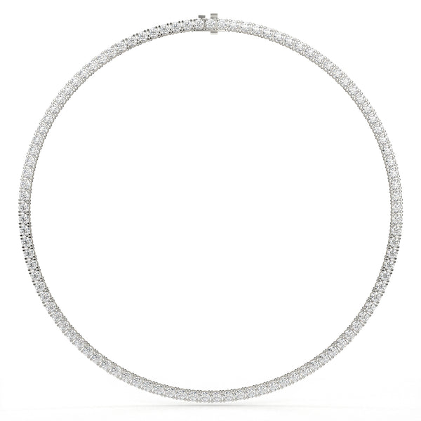 Silver necklace with small round stones on a white background