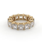 Gold ring with diamond accents on a white background